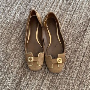 Tory Burch suede neutral flats with gold heel.  Runs slightly wide.